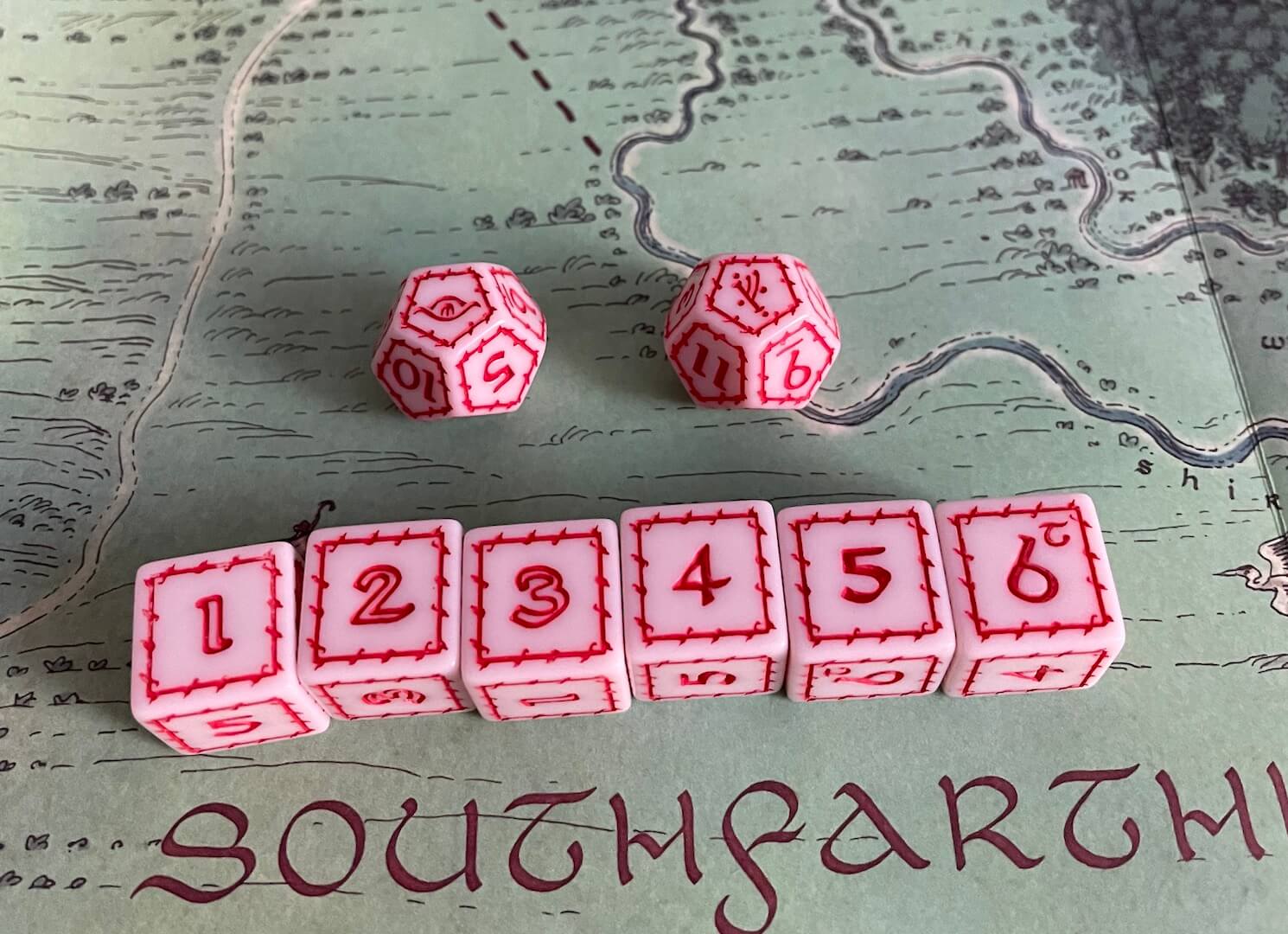 Custom dice included in The One Ring RPG Starter Set